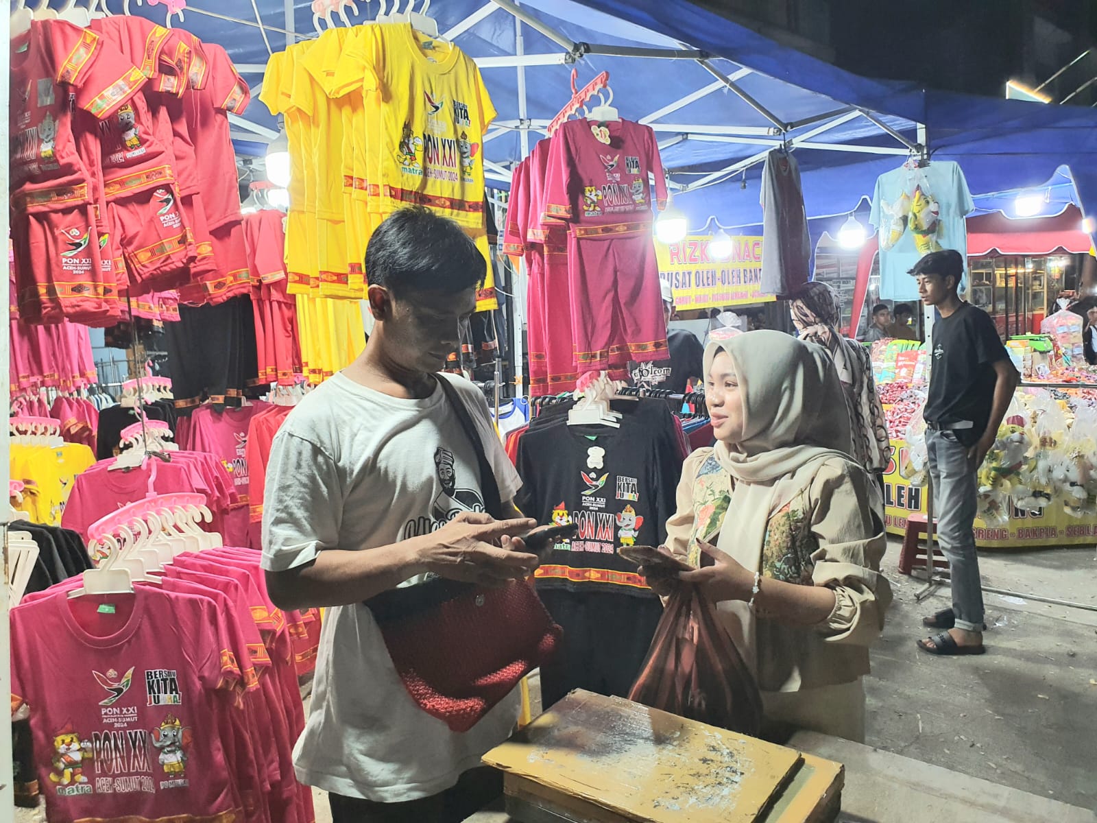 Dampak Ekonomi PON XXI Aceh-Sumut 2024: Omzet Pedagang Kaos Naik, Dua Minggu Bisa Raup Rp10-20 Juta